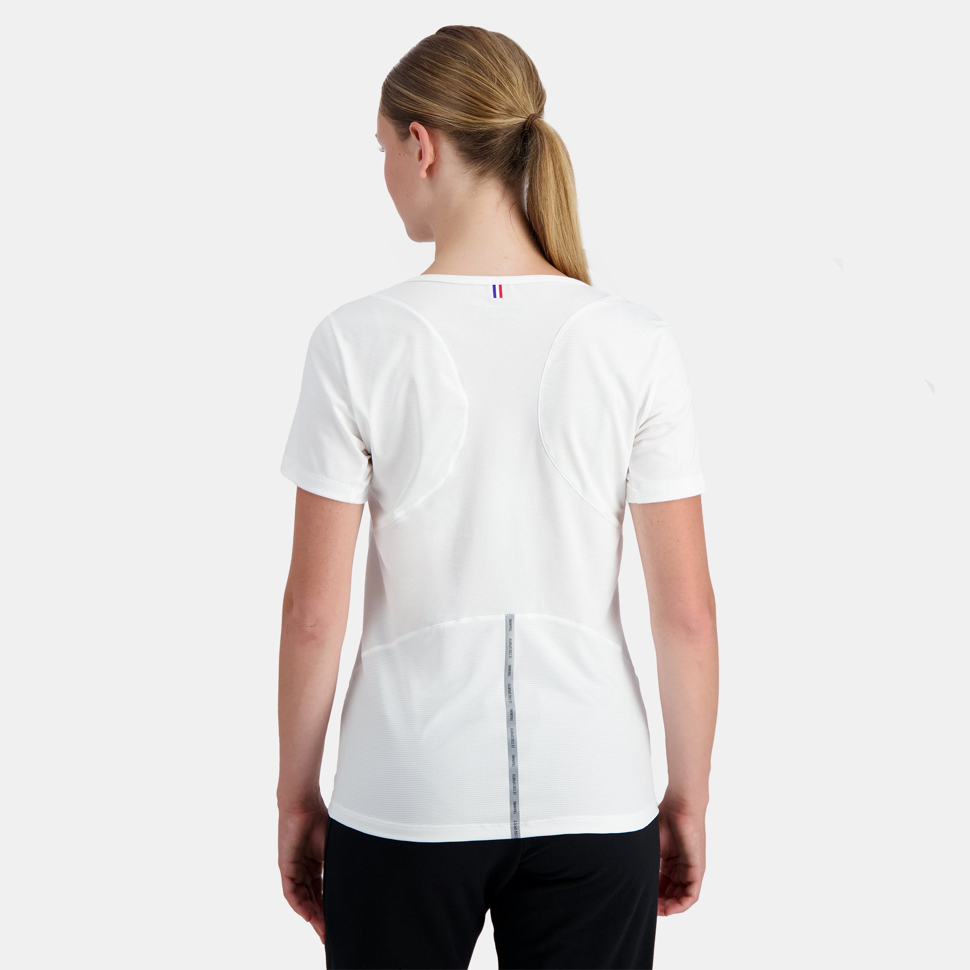 2310655-TRAINING LF Tee SS N°3 W new optical whi  | Camiseta Mujer